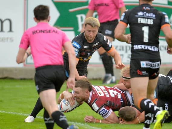 Jackson Hastings goes over for Wigan's first try in more than five consecutive halves of play