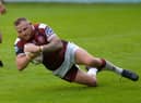 Brad Singleton goes over for a try