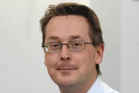 Dr Tim Dalton