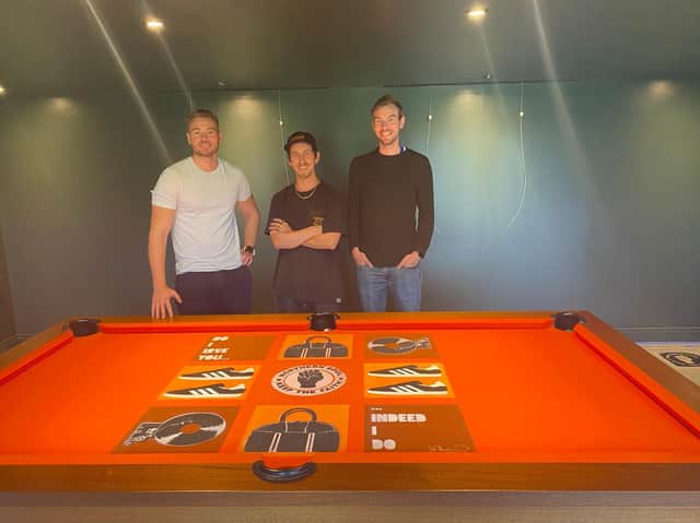 Spray artist Joe Charman with Philip and Stuart Parkinson