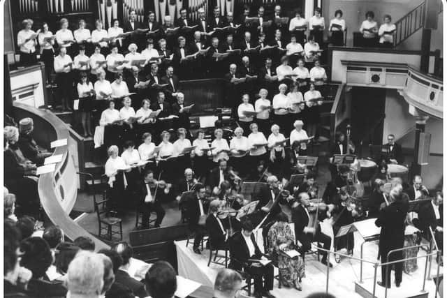 The choir in full flow decades ago at the old Queen's Hall