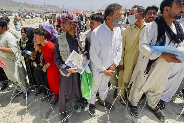People waiting to be evacuated from Kabul