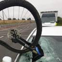 The bike embedded in the car