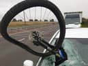 The bike embedded in the car