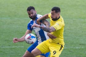 Curtis Tilt in action for Latics last season