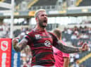 Zak Hardaker celebrates his try