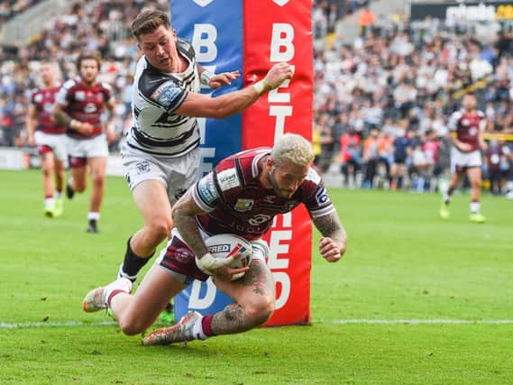 Zak Hardaker goes over against Hull FC to help secure fourth spot and a home play-off game