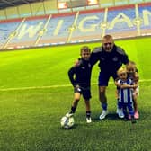 Max Power and family at the DW after a recent game