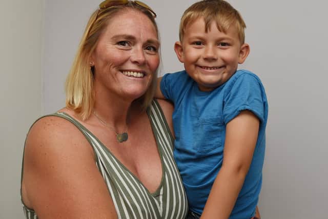 Laura Grundy from Orrell with son Owen, seven, who has autism. Laura wants people to understand the neuro-divergent condition.