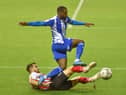 Stand-in skipper Gavin Massey gets stuck in against Sunderland