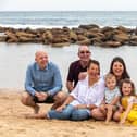 Sam Payne, the CEO and co-founder of Pink Elephant, with her family