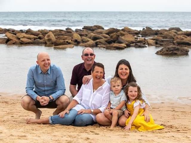 Sam Payne, the CEO and co-founder of Pink Elephant, with her family