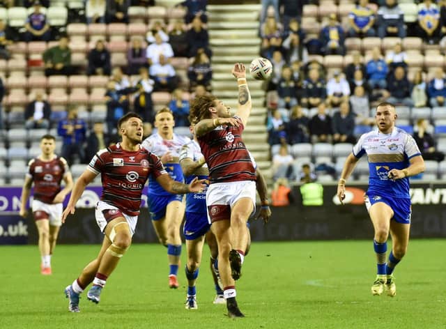 Joe Shorrocks chases a charged-down ball