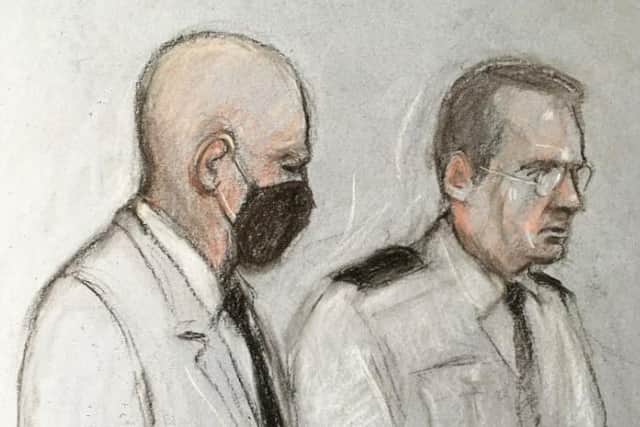Court artist sketch by Elizabeth Cook of former police officer Wayne Couzens at the Old Bailey in London after the 48-year-old was handed a whole life order for the kidnap, rape and murder of Sarah Everard