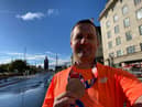 Chris Green celebrates with his medal
