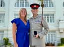 Lee Arnold and wife Roseann with the medal