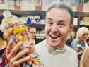 Alan Halsall helped to cut the ribbon of the new shop