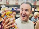 Alan Halsall helped to cut the ribbon of the new shop