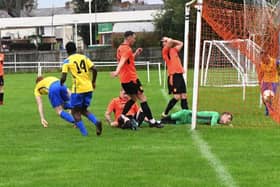 Billinge force the ball home against Daten (Pic: Terry Pope)