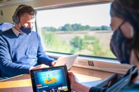 A passenger using their hypnotherapy app Clementine, as the free courses which use visualisation techniques are available on its West Coast Main Line services.
