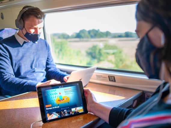 A passenger using their hypnotherapy app Clementine, as the free courses which use visualisation techniques are available on its West Coast Main Line services.