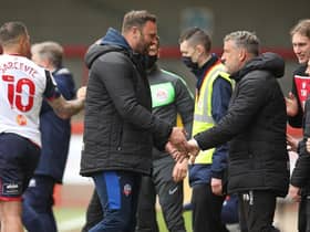 Ian Evatt with his assistant, Latics legend Peter Atherton