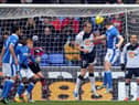 Gary Caldwell heads past Adam Bogdan to give Latics the lead at Bolton in February 2012