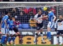 Gary Caldwell heads past Adam Bogdan to give Latics the lead at Bolton in February 2012