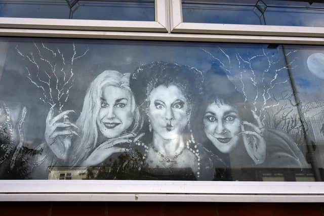 Snow Graffiti artist Scott Wilcock has created window displays for Halloween at his home in Ashton-in-Makerfield, one of which being Hocus Pocus