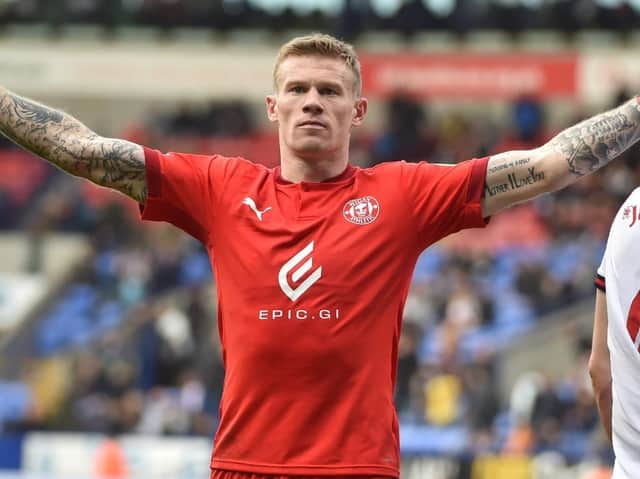 James McClean celebrates scoring his second and Latics' fourth goal at Bolton