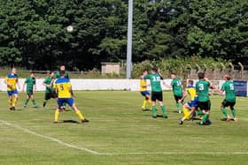 Ashton Athletic in action