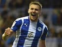 Charlie Wyke celebrates opening the scoring