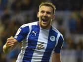 Charlie Wyke celebrates opening the scoring