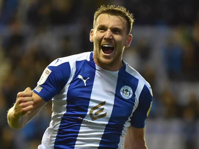 Charlie Wyke celebrates opening the scoring