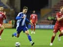 Callum Lang in action against MK Dons