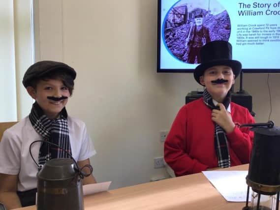 Local children learned about William Crook and looked at artefacts