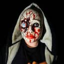 A ghoulish zombie waiting to pounce at Terror Mall
