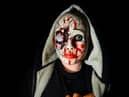 A ghoulish zombie waiting to pounce at Terror Mall