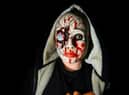A ghoulish zombie waiting to pounce at Terror Mall