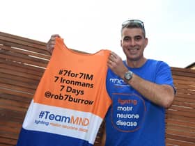 Martyn with the jersey he will be completing his challenge in