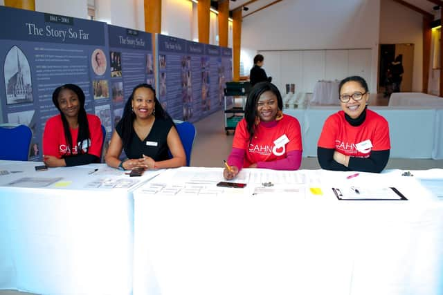 Members of CAHN at an International Womens Day event