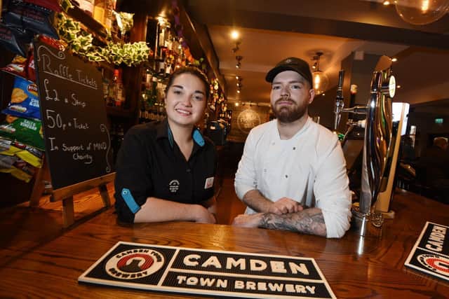 the pub has re-opened after a renovation. from left, Manager Taylor Smith and chef Shaun Taylor.