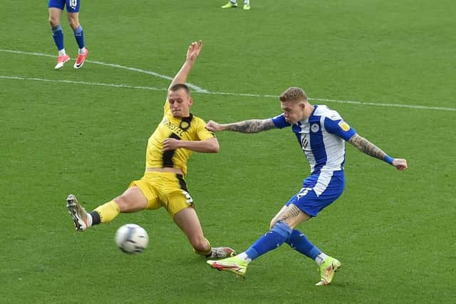James McClean fires in a shot against Burton