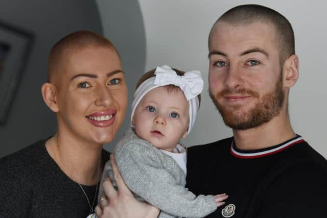 Estelle Wignall with husband Mike and their daughter Brooke