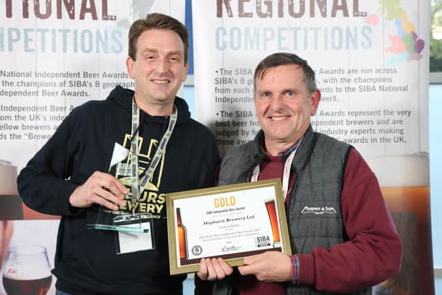 Stuart Hurst (left) accepts his overall winner prize from Nick Brading (Murphy & Son Ltd, Award Sponsor) at the Society of Independent Brewers (SIBA) North West Independent Beer Awards 2021