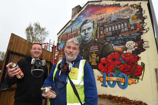 Evan Barlow and Tony Kelzo painted the mura
