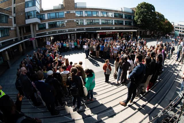 Students stage a climate change protest at Lancaster University. After a long-running campaign by students and staff, the university has announced it will divest itself of investments in fossil fuel companies, as well as screening out arms trade and tobacco investments