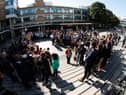 Students stage a climate change protest at Lancaster University. After a long-running campaign by students and staff, the university has announced it will divest itself of investments in fossil fuel companies, as well as screening out arms trade and tobacco investments