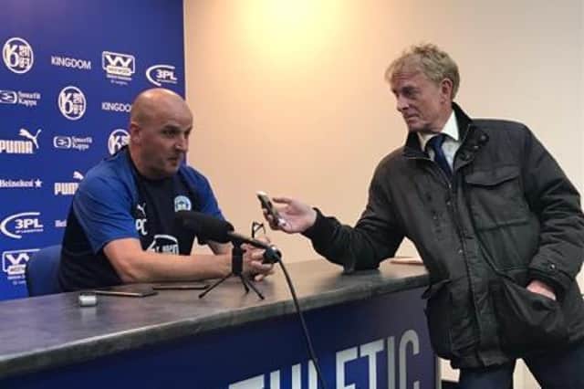 Paul Rowley interviewing Paul Cook when he was manager of Wigan Athletic
