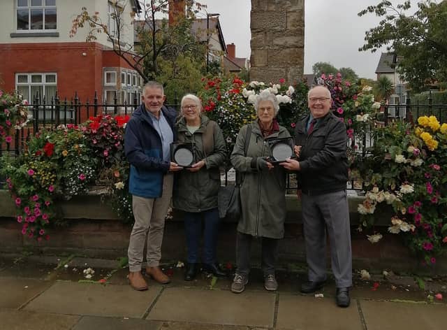 Sheila Livesey and Janice Powell receive Heart of the Community awards from councillors Lawrence Hunt and George Davies